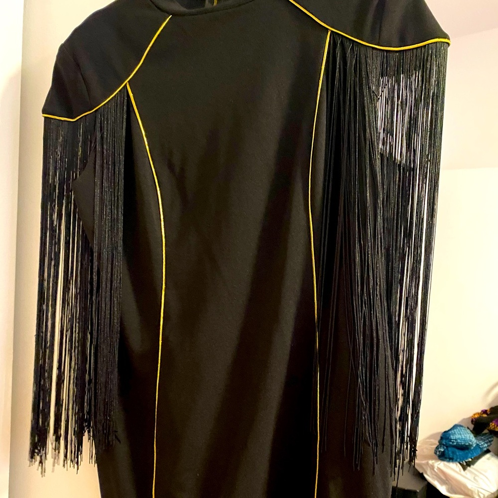 This black dress with sexy fringes! Worn once